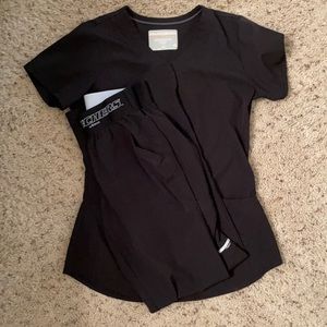 Size XXS for top & bottoms. Sketcher scrubs.